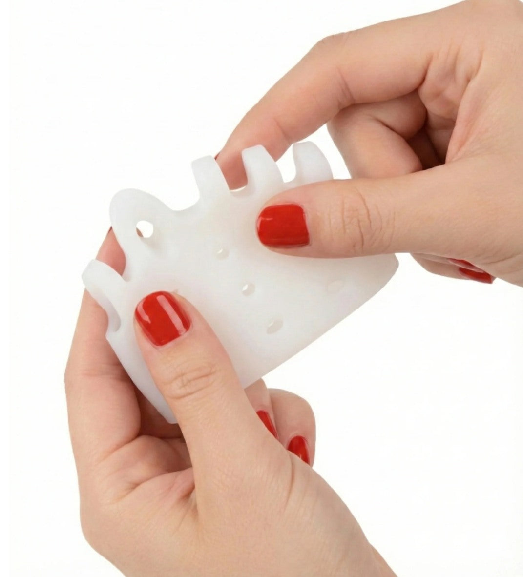 Hands demonstrating the flexibility of the silicone